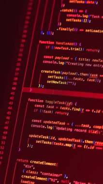 Real-time generated typing danger in closeup shot on monitor - white letters running on red background - concept of digitisation, security, research and course of a program script