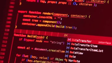 Real-time generated typing danger in closeup shot on monitor - white letters running on red background - concept of digitisation, security, research and course of a program script