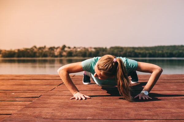 beautiful girl and morning push-ups