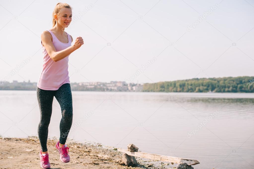  girl running on the beach