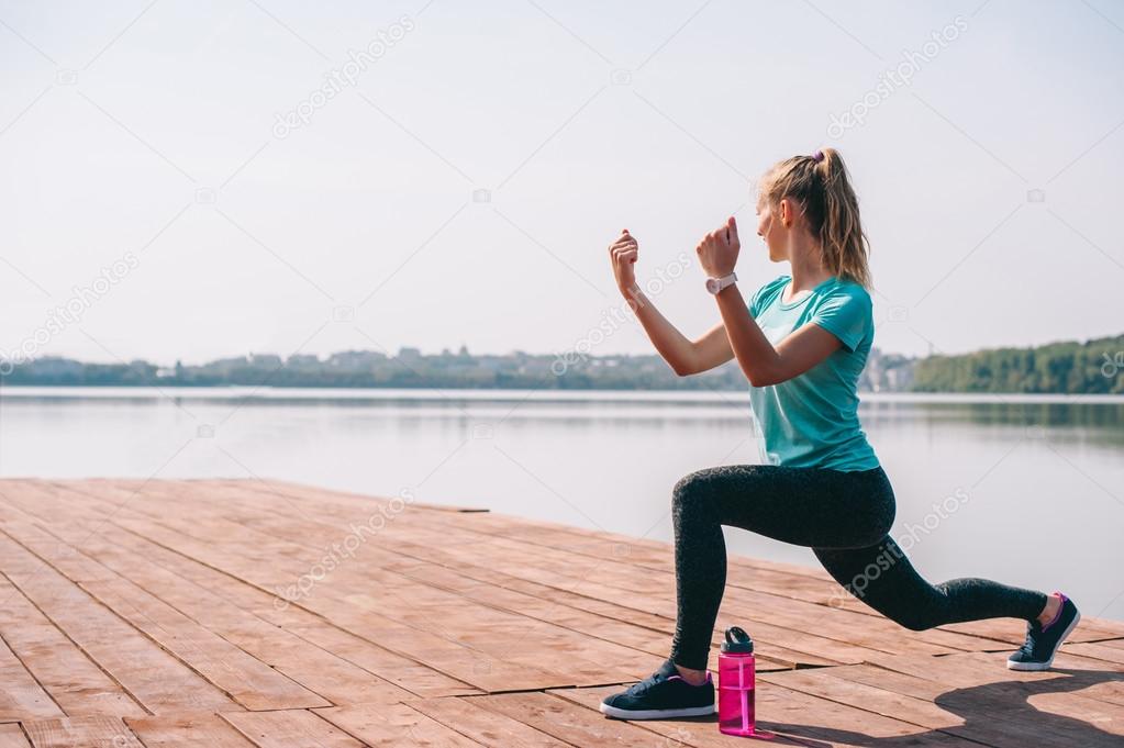 training girl on the dock 