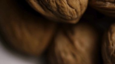 Ekstrem makro ceviz kabuğu çıkıntıları ve dokusunun doğal sağlıklı besin bileşeni ve beyin sağlığı konsepti detaylarını kapat