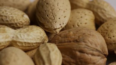 Cevizli badem ve fıstıklı karışık fındıklar Sağlıklı Atıştırmalık Kavramları İçin Yakın Doku Arkaplanı