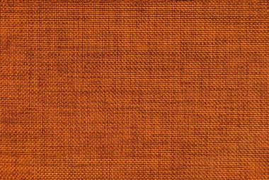 Close up of orange linen wallpaper or fabric. Graphic background. Orange micro linen and denim pattern seamless background texture.