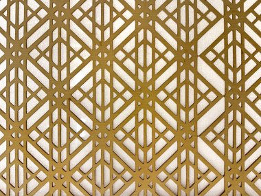 Kontrplaktan oyulmuş geometrik altıgen şekilli deseni kapat. 3D kesme lazer kesim altıgen şekiller sıcak, parlak ahşap tonuyla tamamlandı. Kusursuz arkaplan dokusu.