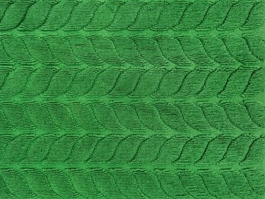 Örgü şeklinde sıralanmış yapraklı yeşil kumaş. Döşeme kumaşı, duvar kağıdı, örtü ya da grafik arka plan için uygun. Kusursuz arkaplan dokusu.