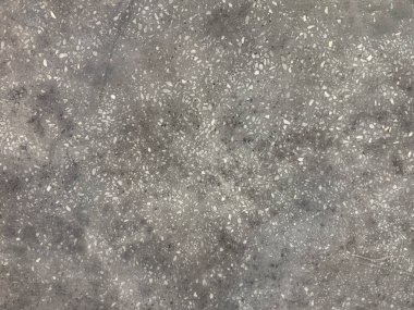 Çimento desenini fırça darbesi, tahıl, grunge ve toprak deseniyle kapatın. Duvar ve zemin için uygun. Kusursuz arkaplan dokusu.