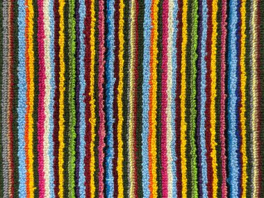 Renkli renkli renkli kumaş şeritlerini pek çok renkle kapatın. Genç ve bin yıllık görünümlü. Kumaş, tekstil, paspas, döşeme ve giysi için uygun. Kusursuz arkaplan dokusu.