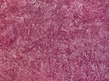 Dekoratif kırmızı morumsu boya bir yüzeye bulaştı. Rastgele kırmızı morumsu desenli, yıkanmış grunge ve toprak desenli boya. Kusursuz arkaplan dokusu.