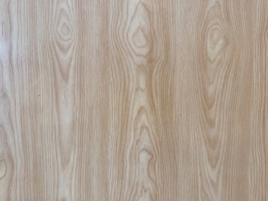 Katı ahşap damar dokusunu kapatın. Duvarda tipik damarları olan doğal krem kahverengi ahşap. Duvar örtmek için uygun. Kusursuz arkaplan dokusu