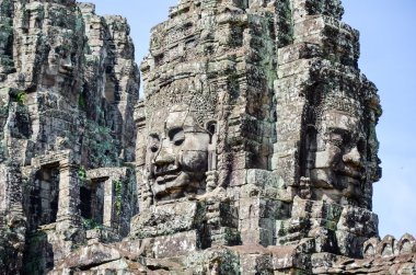 Buda yüzleri Angkor Wat karmaşık tapınakta Bayon, Siem Reap, Kamboçya. 1 Eylül 2015