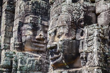 Buda yüzleri Angkor Wat karmaşık tapınakta Bayon, Siem Reap, Kamboçya. 1 Eylül 2015
