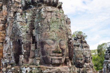 Buda yüzleri Angkor Wat karmaşık tapınakta Bayon, Siem Reap, Kamboçya. 1 Eylül 2015