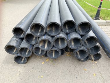 HDPE water supply pipes for construction in the city, repair process of urban water supply systems. HDPE is high density polyethylene.