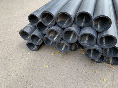 HDPE water supply pipes for construction in the city, repair process of urban water supply systems. HDPE is high density polyethylene.