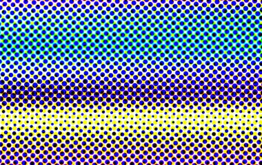 Sarı ve yeşil renkte küçük mavi ve siyah noktalar içeren renkli bir yarım ton deseni var....