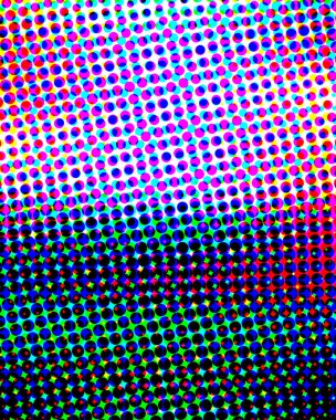 Farklı renklerde küçük noktalar içeren renkli bir yarım ton deseni, parlaklıktan parlaklığa kayar...
