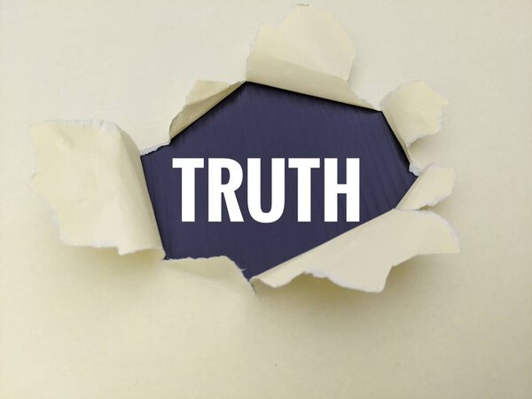 A black panel peeks through torn beige paper, symbolizing truth, honesty and transparency. This image conveys revelation, clarity and the uncovering of reality beyond illusion or secrecy