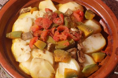A close-up shot of a fresh moroccan tajine with vegetables