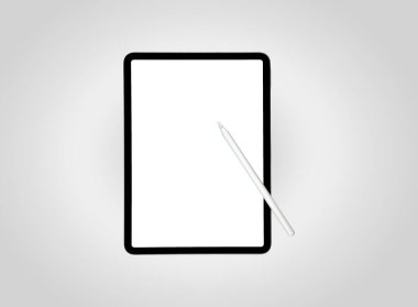 Bir tablet ve stil düz bir yüzeyde çizim ya da yazma için hazır bekliyor. Yüzey boş, yaratıcılığı ve fikirleri onu doldurmaya davet ediyor..