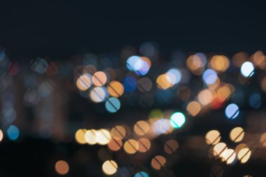 Bokeh renkli ışıklar şehri, soyut arkaplan, metin için boşluk.