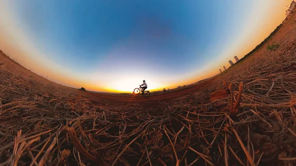 Black Man Helmet Glasses Riding Bicycle Sunset — Stock Photo, Image