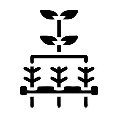 Siyah ve beyaz bir ikon, altında tarım ve bitki gelişimini sembolize eden birden fazla yaprağı ve yapılandırılmış bir sistemi olan büyüyen bir bitkiyi tasvir ediyor..