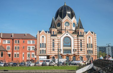 Kaliningrad, Russia - may 10, 2021: view of modern beautiful facade of New synagogue on sunny day with clear blue sky