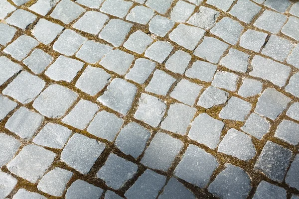 Fondo estructurado abstracto de un viejo patrón de losas de pavimento de calle — Foto de Stock