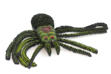 Beyaz arka plan üzerinde örümcek oyuncak