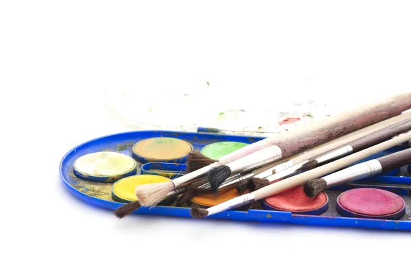 Set of watercolor paints with brushes on white background — Stock Photo, Image