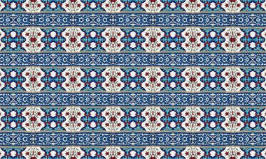 Mavi, kırmızı ve beyaz tonlarında çiçek ve geometrik tasarımların karışımından oluşan renkli ve çetrefilli bir desen Fas fayanslarını anımsatıyor..