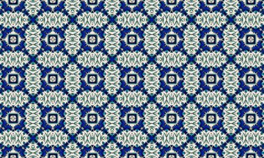 Krem bir arka planda mavi ve yeşil çiçekleri içeren renkli ve karmaşık bir desen, tekstil tasarımı ve dekorasyonunda mükemmel.