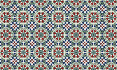 Renkli ve karmaşık bir çiçek deseni. Kırmızı, mavi ve yeşil şekiller beyaz arka planda tekrarlanan bir dizayn..