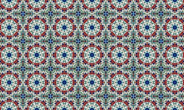 Mavi, kırmızı ve yeşil şekilli canlı ve karmaşık bir çiçek deseni beyaz arka planda tekrarlanan bir dizayn..