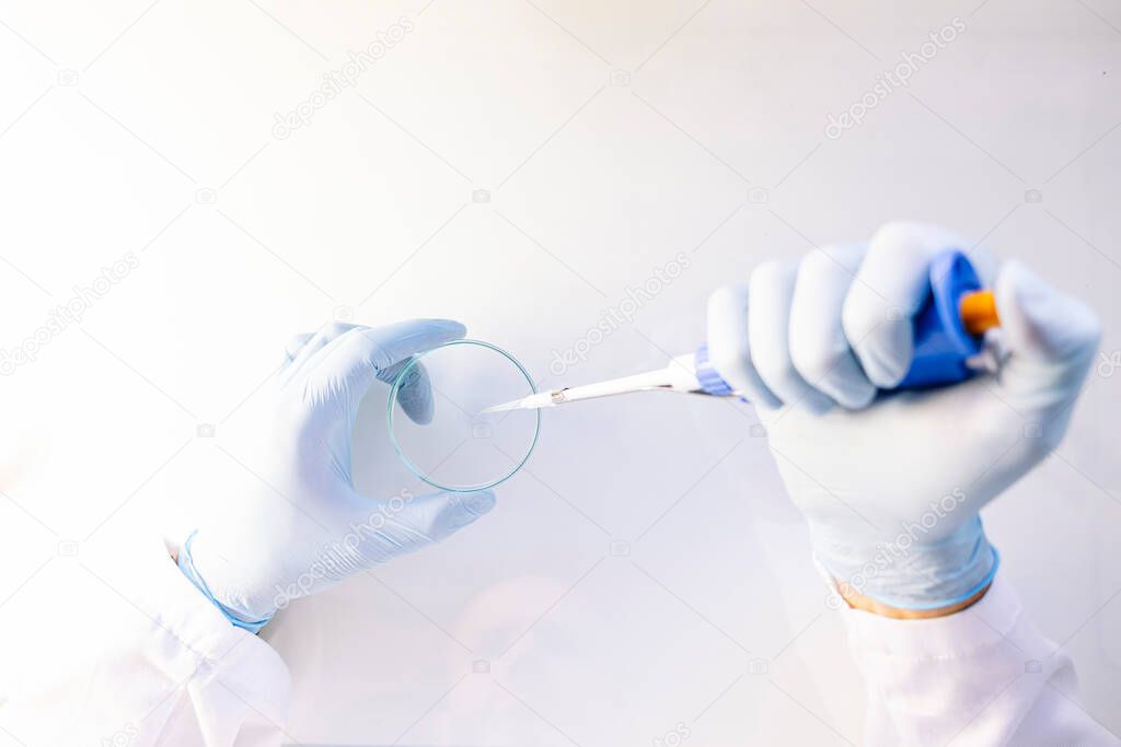 Unrecognizable man working in a professional laboratory