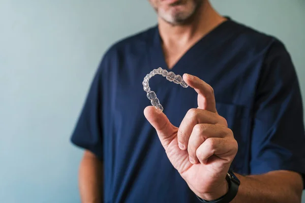 Male Doctor Holds Transparent Dental Aligner His Hand — Stock Photo, Image