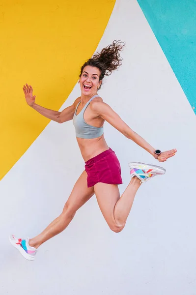 Athlete Woman Giving Big Jump Healthy Life Concept —  Fotos de Stock