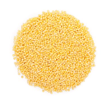 Heap of millet groats isolated on white. Top view. clipart