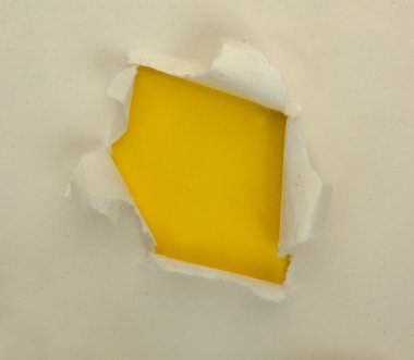 Sarı arka planlara sahip kaba soluk yırtık kağıt