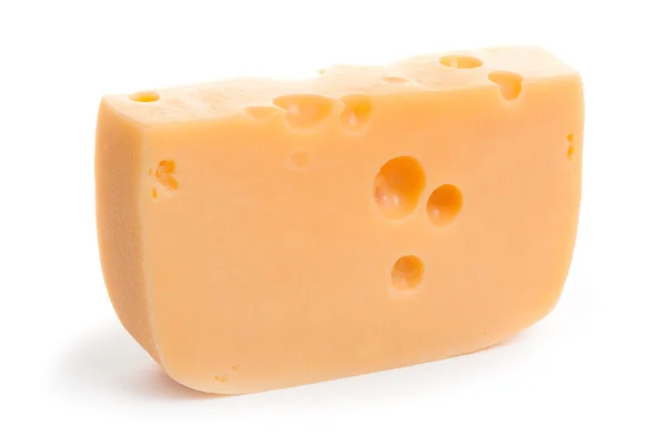 Pedazo de queso aislado sobre un fondo blanco — Foto de Stock