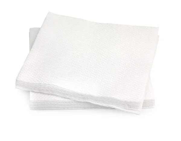 Heap of white paper napkins isolated on white background, close- — Stock Photo, Image