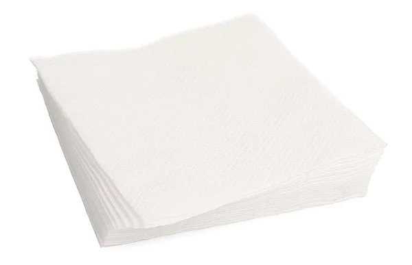 Heap of white paper napkins isolated on white background, close- — Stock Photo, Image