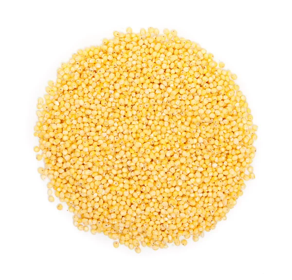 Heap of millet groats isolated on white. Top view. — Stock Photo, Image