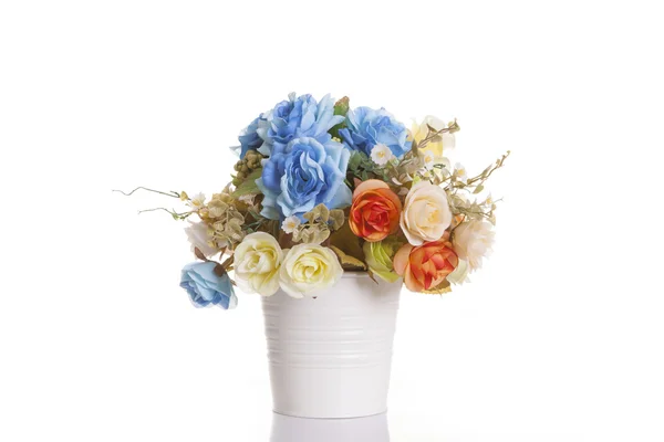 Plastic flower in white pot — Stock Photo, Image
