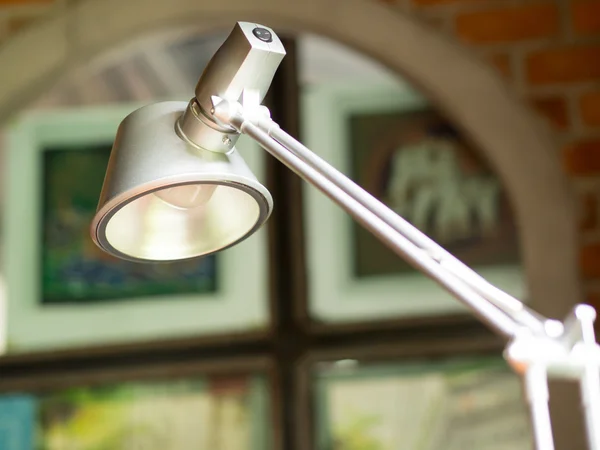 gray desk lamp in coffee shops. vintage style.