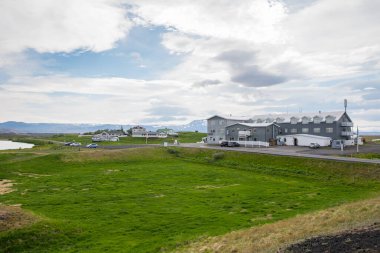 Myvatn Iceland - June 20. 2020: Hotel on the banks of lake Myvatn clipart