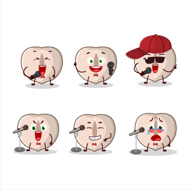 Sevimli bir çizgi film dizaynı olan dilimlenmiş fındık ünlü bir şarkı söylüyor. Vektör illüstrasyonu