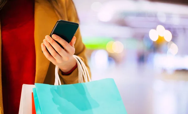 Close Photo Female Hands Shopping Bag Smart Phone Mall While — Stock Photo, Image