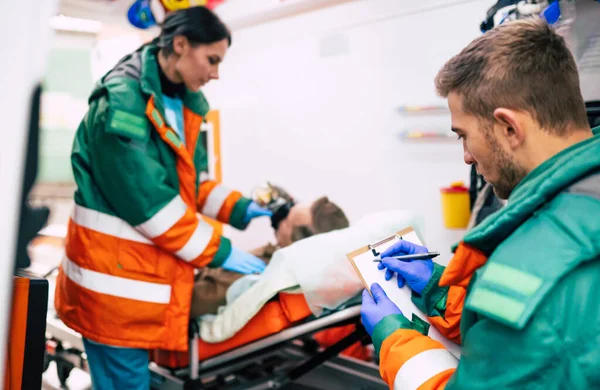 Paramedics Working Senior Man Patient While Lies Stretcher Ambulance — Stock Photo, Image